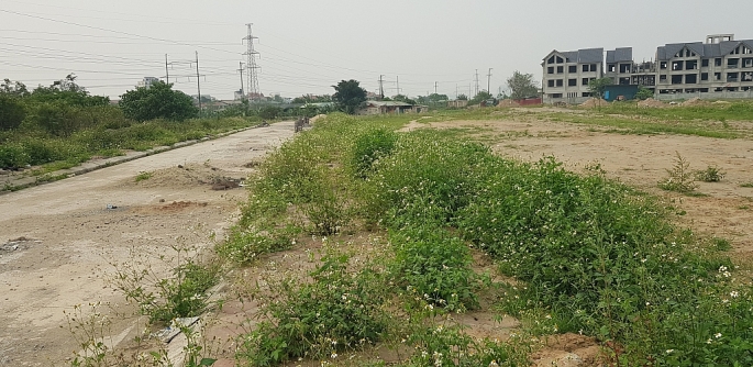 Tại H&agrave; Nội vẫn c&ograve;n nhiều dự &aacute;n nhận đất nhưng chậm triển khai. Ảnh: K.H