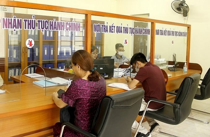 Từ 1/6, tất cả bộ phận một cửa ở H&agrave; Nội thu ph&iacute; kh&ocirc;ng d&ugrave;ng tiền mặt.