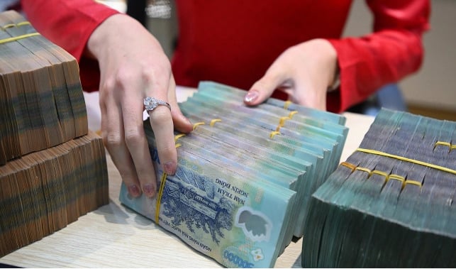 Ng&acirc;n h&agrave;ng đua trả cổ tức tiền mặt, nhiều nh&agrave; băng chi h&agrave;ng tỷ USD cho cổ đ&ocirc;ng (Ảnh minh họa).