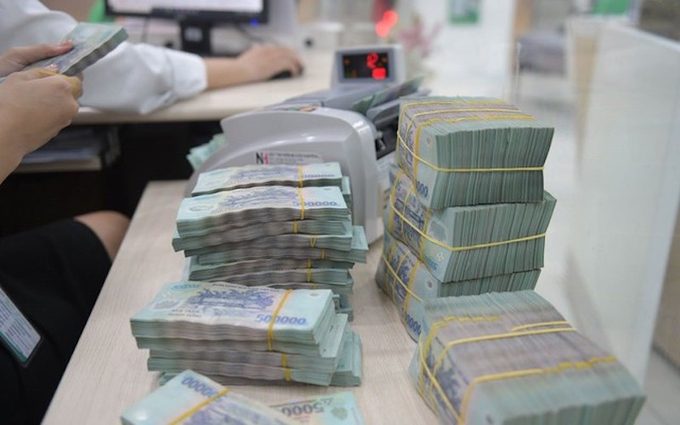 L&atilde;i suất li&ecirc;n tục giảm, ng&acirc;n h&agrave;ng "thừa tiền", v&igrave; sao doanh nghiệp vẫn kh&oacute; vay?.