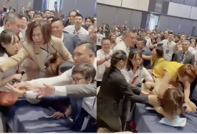 Trong video, nhiều người vừa tranh gi&agrave;nh, x&ocirc; đẩy nhau, vừa la h&eacute;t, tạo n&ecirc;n khung cảnh nhốn nh&aacute;o tại buổi mở b&aacute;n.