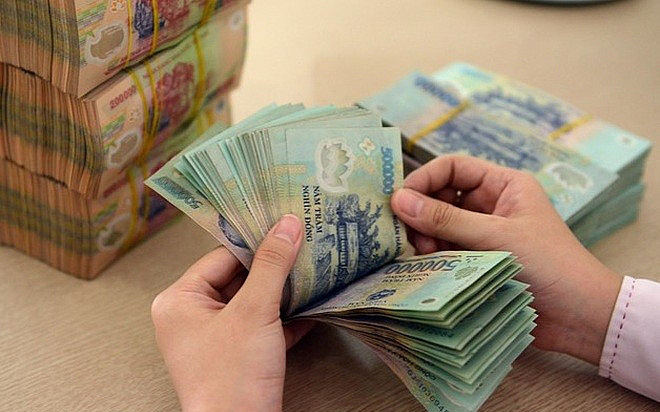 Nhu cầu gửi tiền của người dân giảm mạnh - Ảnh 1