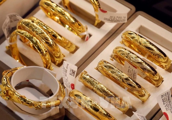 V&agrave;ng thế giới tăng vọt, USD giảm trượt gi&aacute;.