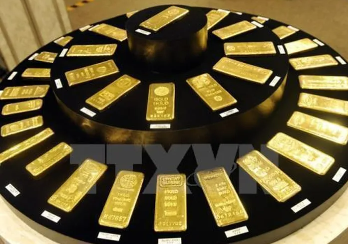 V&agrave;ng quay đầu giảm đồng loạt tại nhiều thương hiệu lớn. Ảnh minh họa: TTXVN