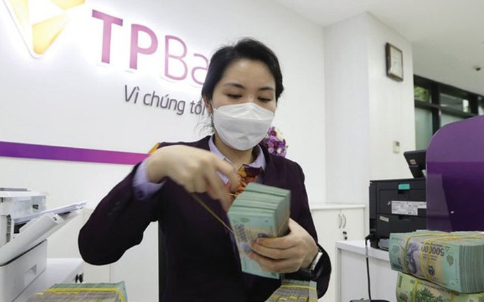 Hơn 60.000 tỷ đồng được Ng&#226;n h&#224;ng Nh&#224; nước bơm ra thị trường trong 3 tuần - Ảnh 1