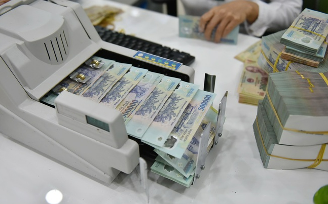 C&aacute;c ng&acirc;n h&agrave;ng được y&ecirc;u cầu xử l&yacute; nghi&ecirc;m trường hợp "&eacute;p" kh&aacute;ch h&agrave;ng mua bảo hiểm khi vay vốn. Ảnh minh họa