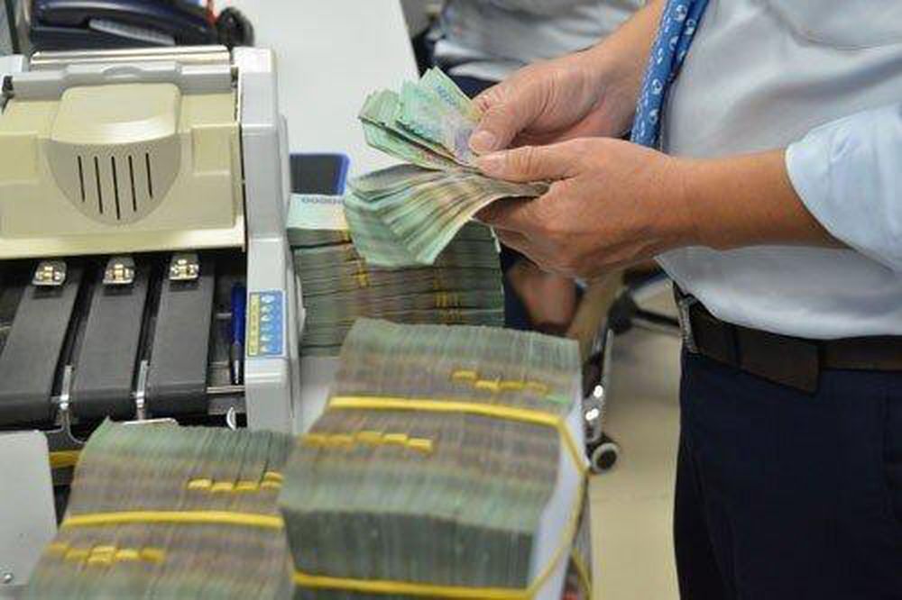 &#39;Bảo bối&#39; n&#224;o gi&#250;p ng&#226;n h&#224;ng chưa hết năm đ&#227; dồn dập &#39;khoe&#39; l&#227;i khủng? - Ảnh 1