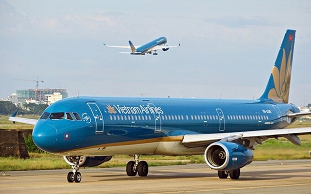Kinh doanh thua lỗ, Vietnam Airlines lại bị phạt trong chứng kho&#225;n - Ảnh 1